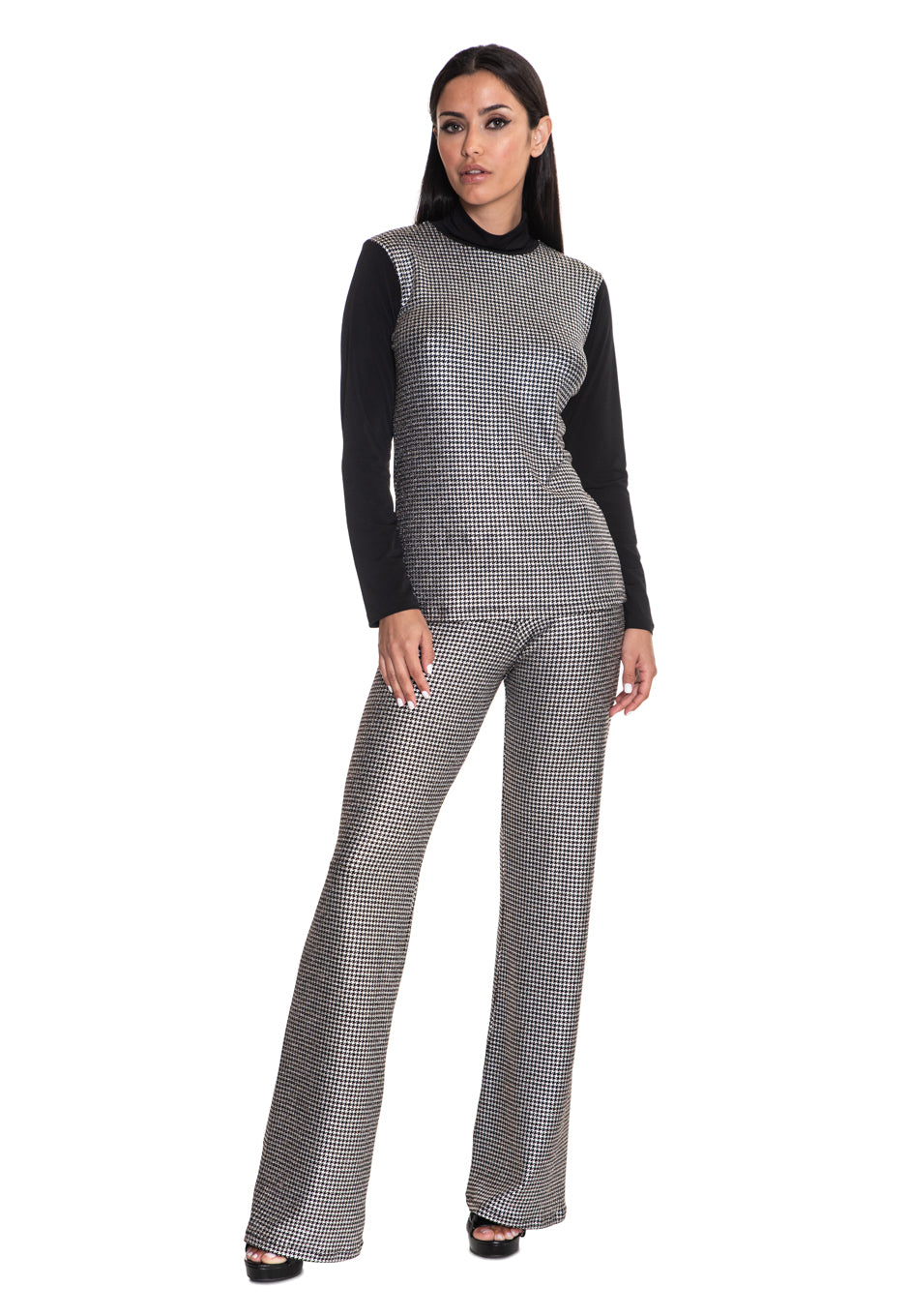 Model wearing high-gloss liquid silver two-piece outfit