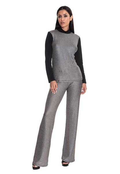 Model wearing high-gloss liquid silver two-piece outfit
